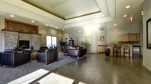 225-4380 Lakeshore Road, Kelowna, BC - Indoor With Fireplace