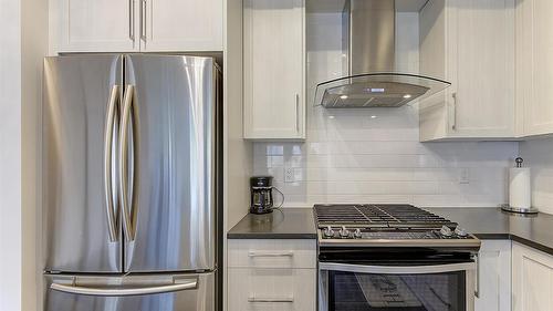 225-4380 Lakeshore Road, Kelowna, BC - Indoor Photo Showing Kitchen With Stainless Steel Kitchen