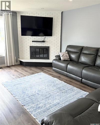 510 Redberry Road, Saskatoon, SK - Indoor Photo Showing Living Room With Fireplace