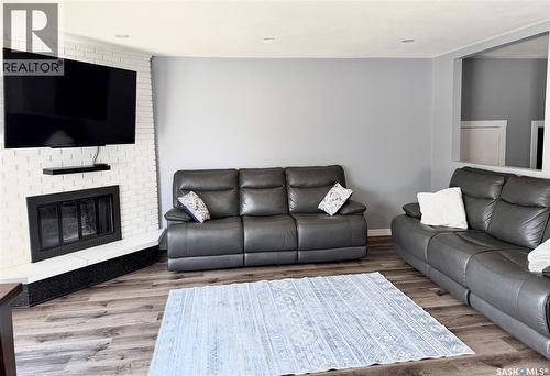 510 Redberry Road, Saskatoon, SK - Indoor Photo Showing Living Room With Fireplace