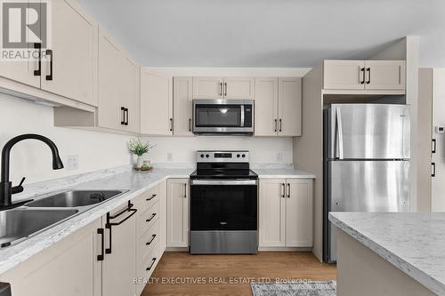 31 Whitcomb Crescent, Smiths Falls, ON - Indoor Photo Showing Kitchen With Stainless Steel Kitchen With Double Sink