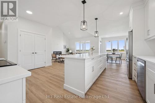 74 Bedell Drive, Mapleton, ON - Indoor Photo Showing Kitchen With Upgraded Kitchen