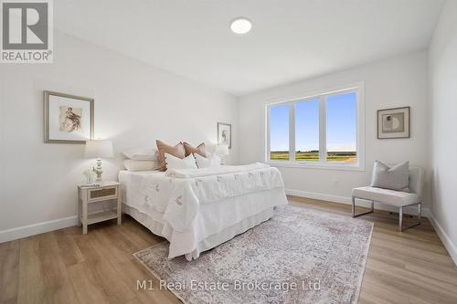 74 Bedell Drive, Mapleton, ON - Indoor Photo Showing Bedroom