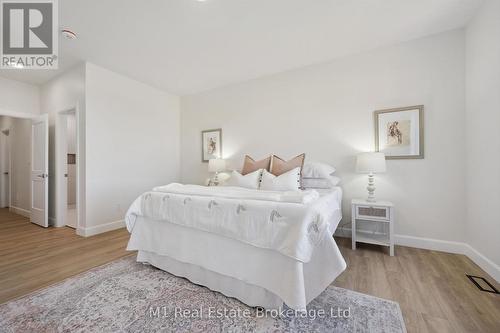 74 Bedell Drive, Mapleton, ON - Indoor Photo Showing Bedroom