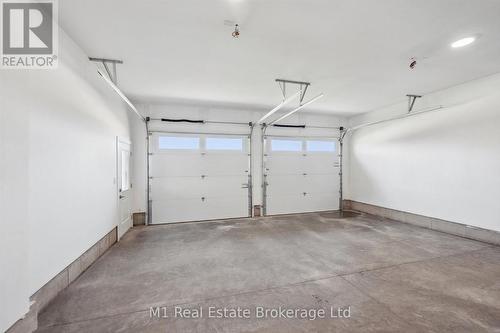 74 Bedell Drive, Mapleton, ON - Indoor Photo Showing Garage