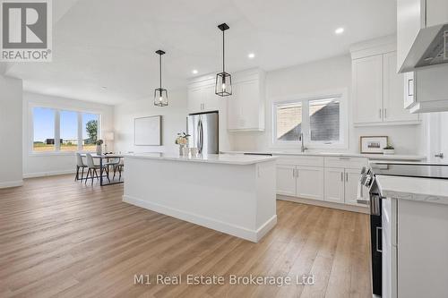 74 Bedell Drive, Mapleton, ON - Indoor Photo Showing Kitchen With Upgraded Kitchen