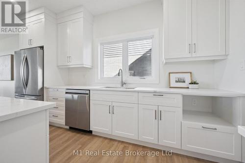 74 Bedell Drive, Mapleton, ON - Indoor Photo Showing Kitchen