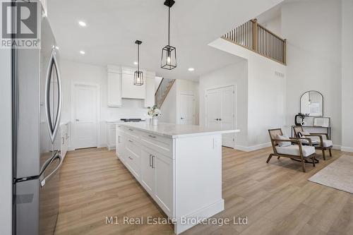 74 Bedell Drive, Mapleton, ON - Indoor Photo Showing Kitchen With Upgraded Kitchen