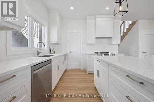 74 Bedell Drive, Mapleton, ON - Indoor Photo Showing Kitchen With Upgraded Kitchen