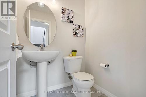 Powder room - main level. - 48 Ambrosia Path, St. Thomas, ON - Indoor Photo Showing Bathroom