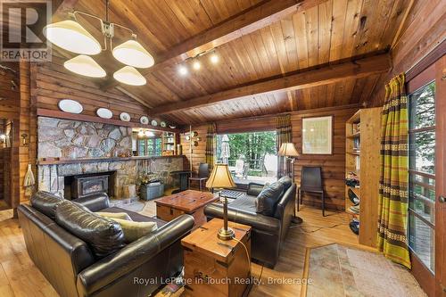 Wood Burning Fireplace in Living Room - 25 Chippewa Crescent, Tiny, ON - Indoor Photo Showing Living Room With Fireplace