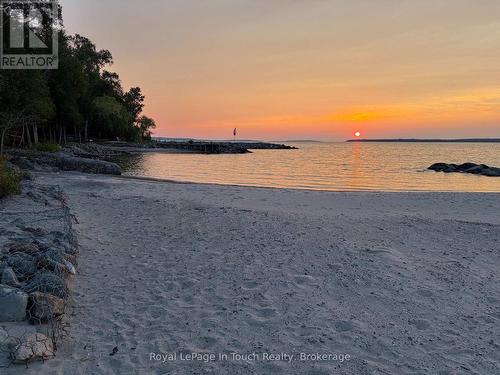 Sunset at 25 Chippewa Cr - 25 Chippewa Crescent, Tiny, ON - Outdoor With Body Of Water With View