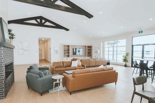 136 Prairie Oak Drive, Mitchell, MB - Indoor Photo Showing Living Room With Fireplace
