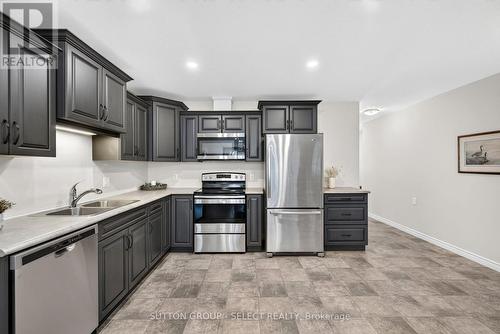 14 Devon Drive, South Huron (Exeter), ON - Indoor Photo Showing Kitchen With Stainless Steel Kitchen With Double Sink
