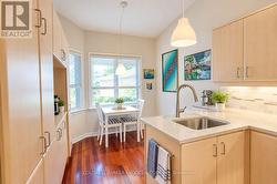 Virtually staged eating area has street views - 