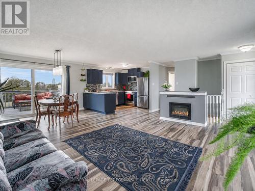 1890 Cassburn Road, Champlain, ON - Indoor Photo Showing Living Room With Fireplace