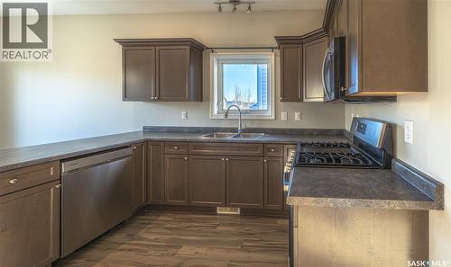 254 Macinnes Street, Saskatoon, SK - Indoor Photo Showing Kitchen With Double Sink