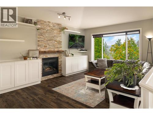3013 Brindisi Place, Kelowna, BC - Indoor Photo Showing Living Room With Fireplace