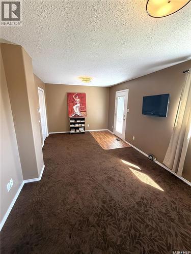 133 Lloyd Crescent, Saskatoon, SK - Indoor Photo Showing Other Room With Fireplace