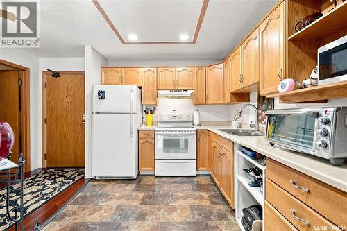 208 410 Main Street, Saskatoon, SK - Indoor Photo Showing Kitchen With Double Sink