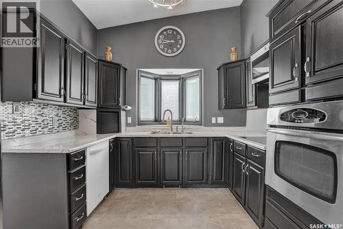 302 Doiron Road N, Regina, SK - Indoor Photo Showing Kitchen With Upgraded Kitchen