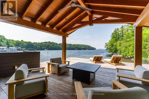 1097 Armstrong Point Road, Muskoka Lakes (Medora), ON - Outdoor With Body Of Water With Deck Patio Veranda With Exterior