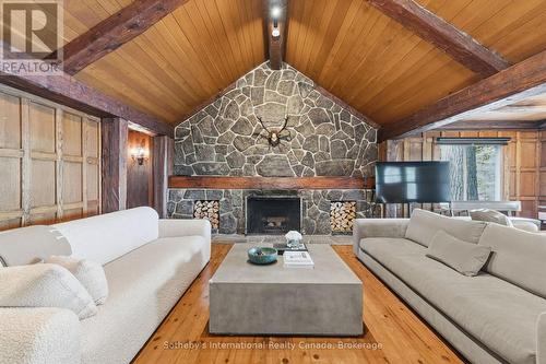 1097 Armstrong Point Road, Muskoka Lakes (Medora), ON - Indoor Photo Showing Living Room With Fireplace