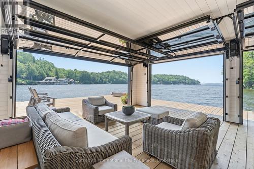 1097 Armstrong Point Road, Muskoka Lakes (Medora), ON - Outdoor With Body Of Water With Deck Patio Veranda