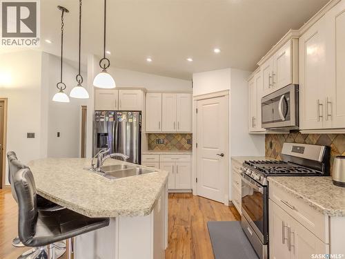 4820 Mccombie Crescent, Regina, SK - Indoor Photo Showing Kitchen With Double Sink