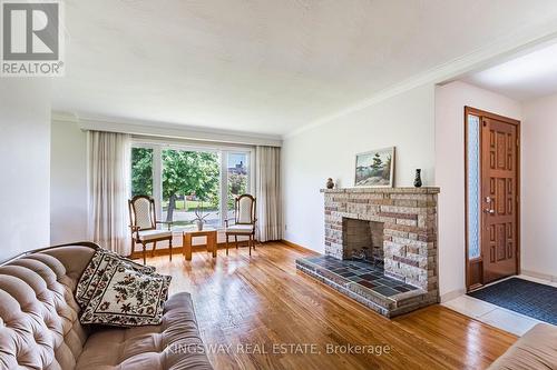 Woodburning Fireplace.  New Windows - 163 Floradale Drive, Mississauga, ON - Indoor Photo Showing Living Room With Fireplace