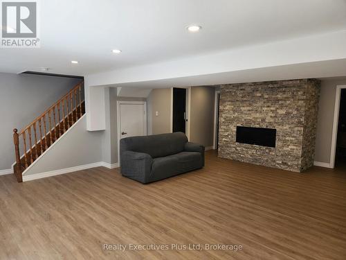 Family Room - 2 Zelia Court, Tiny, ON - Indoor With Fireplace