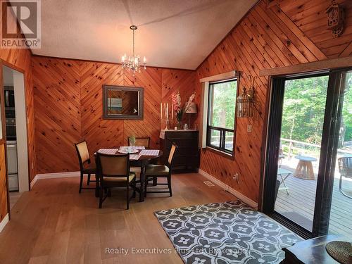 Living Room with Walkout to Front Deck - 2 Zelia Court, Tiny, ON - Indoor Photo Showing Dining Room