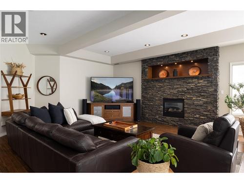 10 Bayview Heights, Coldstream, BC - Indoor Photo Showing Living Room With Fireplace