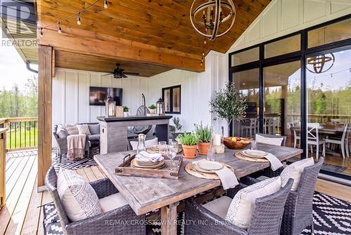Covered Upper Back Deck - 75 Moonstone Road E, Oro-Medonte, ON - Indoor Photo Showing Dining Room