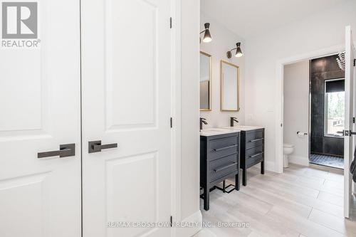 Heated Floors, double sinks, linen closet - 75 Moonstone Road E, Oro-Medonte, ON - Indoor Photo Showing Other Room