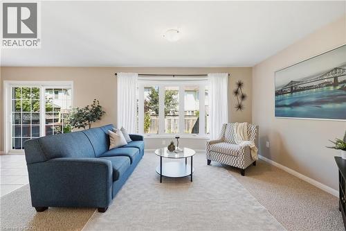 Recessed lighting illuminates neutral-toned walls - 171 Chase Crescent, Cambridge, ON - Indoor Photo Showing Living Room