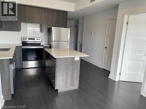 255 E Northfield Drive E Unit# 609, Waterloo, ON - Indoor Photo Showing Kitchen With Stainless Steel Kitchen With Double Sink With Upgraded Kitchen
