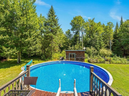 Piscine - 37 Ch. Mercier, Bury, QC - Outdoor With Above Ground Pool With Backyard