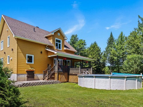 Extérieur - 37 Ch. Mercier, Bury, QC - Outdoor With Above Ground Pool