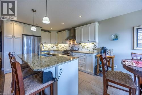 7 Stonebridge Place, Simcoe, ON - Indoor Photo Showing Kitchen With Stainless Steel Kitchen With Double Sink With Upgraded Kitchen