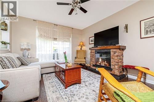 619 Porter Way, Milton, ON - Indoor Photo Showing Living Room With Fireplace