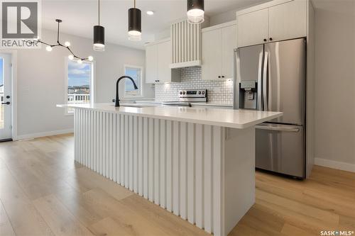 371 Leskiw Bend, Saskatoon, SK - Indoor Photo Showing Kitchen With Upgraded Kitchen