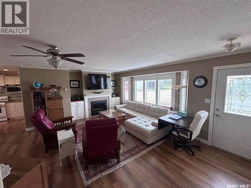 Dew Acreage, Estevan Rm No. 5, SK - Indoor Photo Showing Living Room With Fireplace