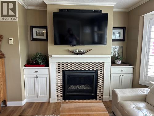 Dew Acreage, Estevan Rm No. 5, SK - Indoor Photo Showing Living Room With Fireplace