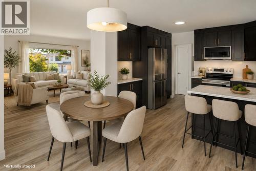 *Virtually staged - 1284 Mcbride Road, Kelowna, BC - Indoor Photo Showing Dining Room