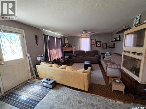 1328 Herbert Avenue, Herbert, SK - Indoor Photo Showing Living Room With Fireplace