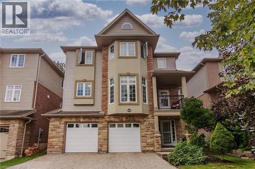 563 Woolgrass Avenue, Waterloo, ON - Outdoor With Balcony With Facade