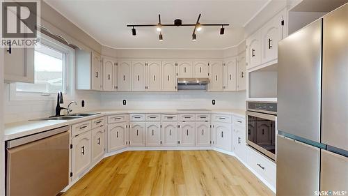 155 Wells Street, Regina, SK - Indoor Photo Showing Kitchen With Double Sink