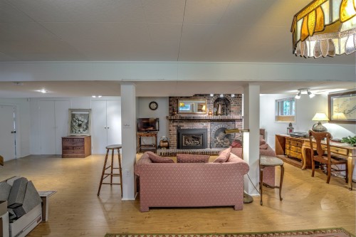 Salle familiale - 145 Ch. De La Gare, Piedmont, QC - Indoor Photo Showing Living Room With Fireplace