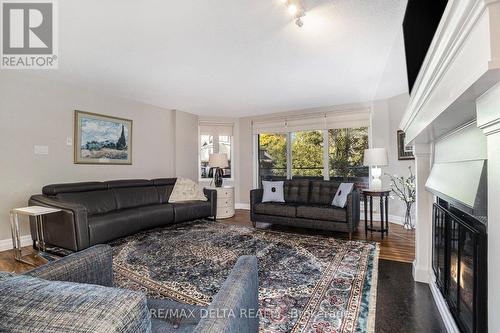 304 - 295 Gilmour Street, Ottawa, ON - Indoor Photo Showing Living Room With Fireplace